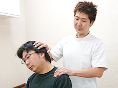 首の手技施術